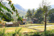 Laos - Maison traditionnelle et rizière