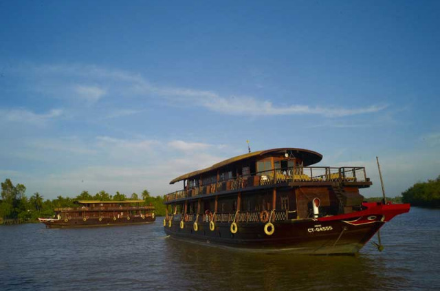 Vietnam - Croisière sur le Mékong - Les bateaux Bassac dans le Delta  © Morgan Ommer - Digital Mekong